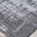 A close-up shot reveals the tightly woven texture and detailed pattern of the Couristan Charm Indoor/Outdoor Rug - Tiverton/Anthracite-Light Grey