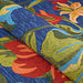 A close-up showcases the textured loops of the Couristan Covington Indoor/Outdoor Rug - Tropical Orchid/Azure-Forest Green-Red