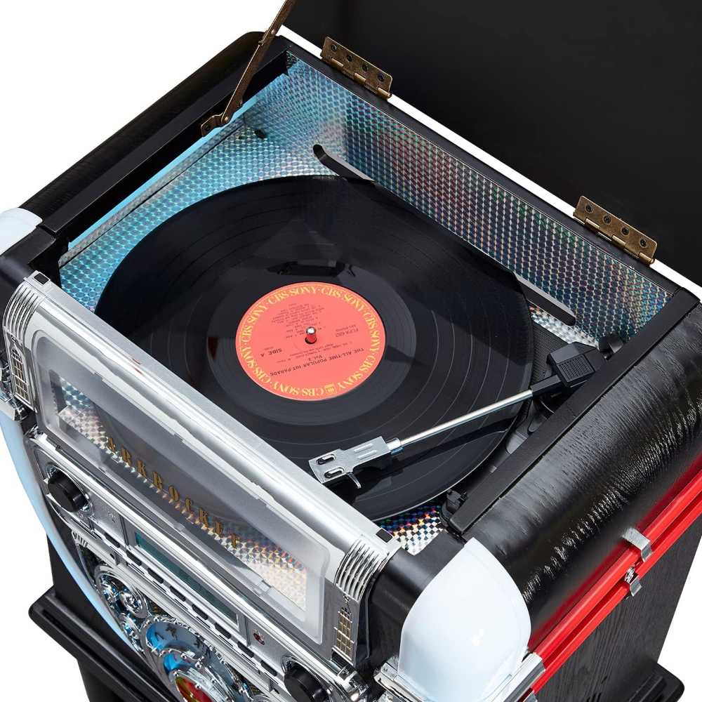 A close-up shows the Arkrocket Boston Tabletop Jukebox Record Player Entertainment System with Stand open revealing a vinyl record spinning