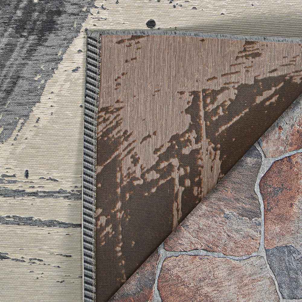 A close-up shows the layered textures and backing details of the Couristan Castille Indoor/Outdoor Rug - Canvas/Glacier