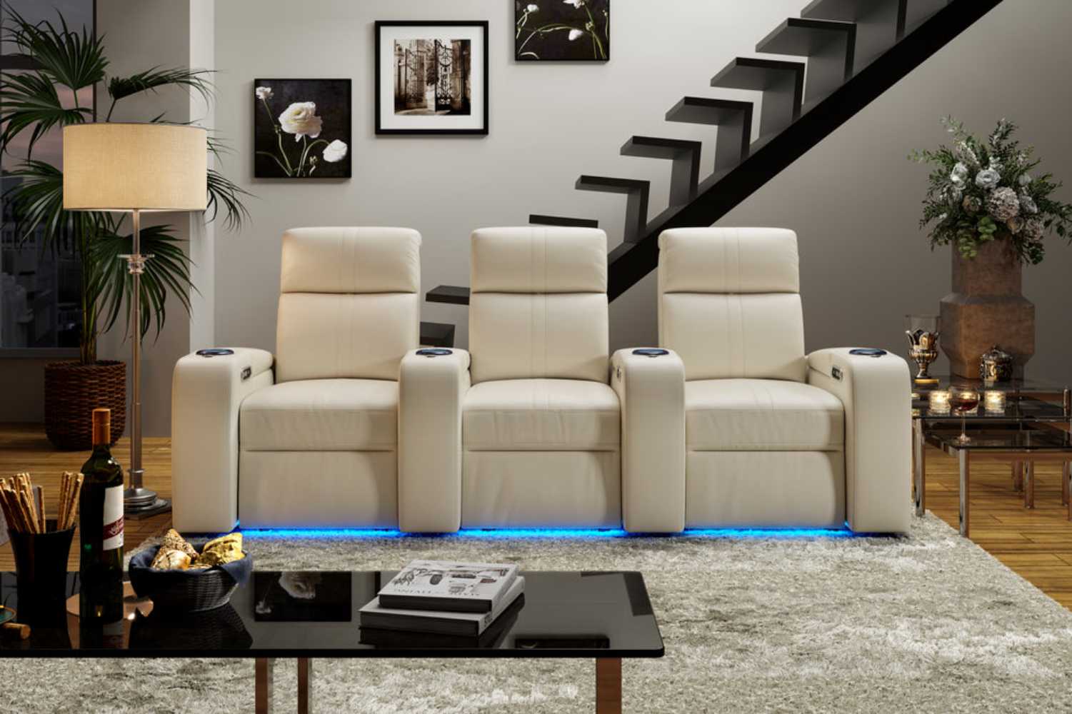 A close-up view highlights the luxurious beige leather finish of Valencia Natalie Home Theater Seating