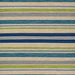 A close-up view of the Couristan Cottages Indoor/Outdoor Rug - Alki/Ocean Shapes shows its textured surface with horizontal stripes in ocean blues, greens, sand, and greys