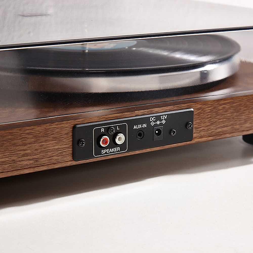 A close-up view shows the back of the Arkrocket Cassini Bluetooth Vinyl Turntable Record Player 40 Watt Stereo Bookshelf Speakers