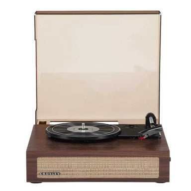 A closed dust cover reveals the elegant wooden design and woven speaker grille of the Crosley Scout Turntable - Walnut