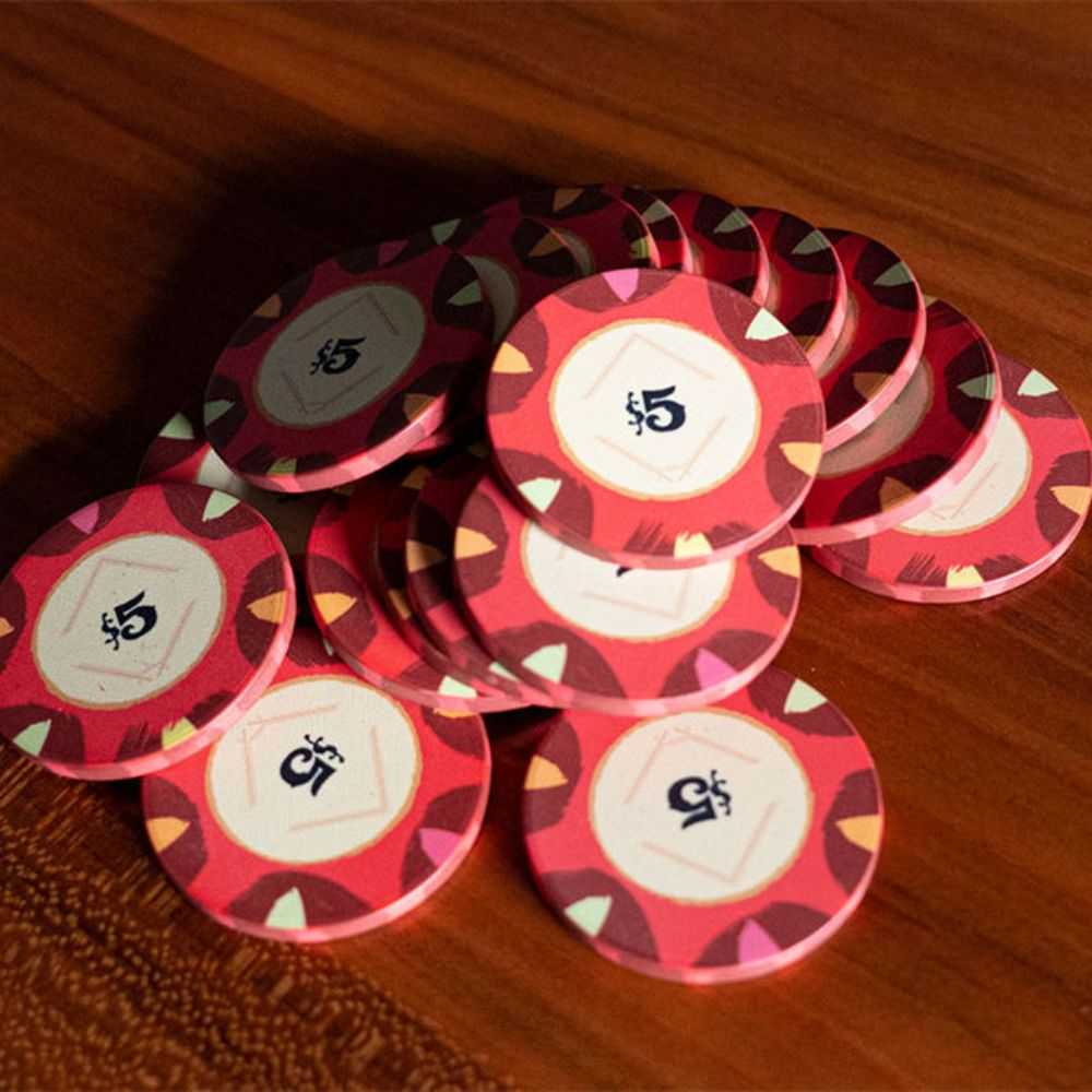 A collection of $5 BBO Poker Tables 500-Piece Classic Casino Poker Chips in a rich red color