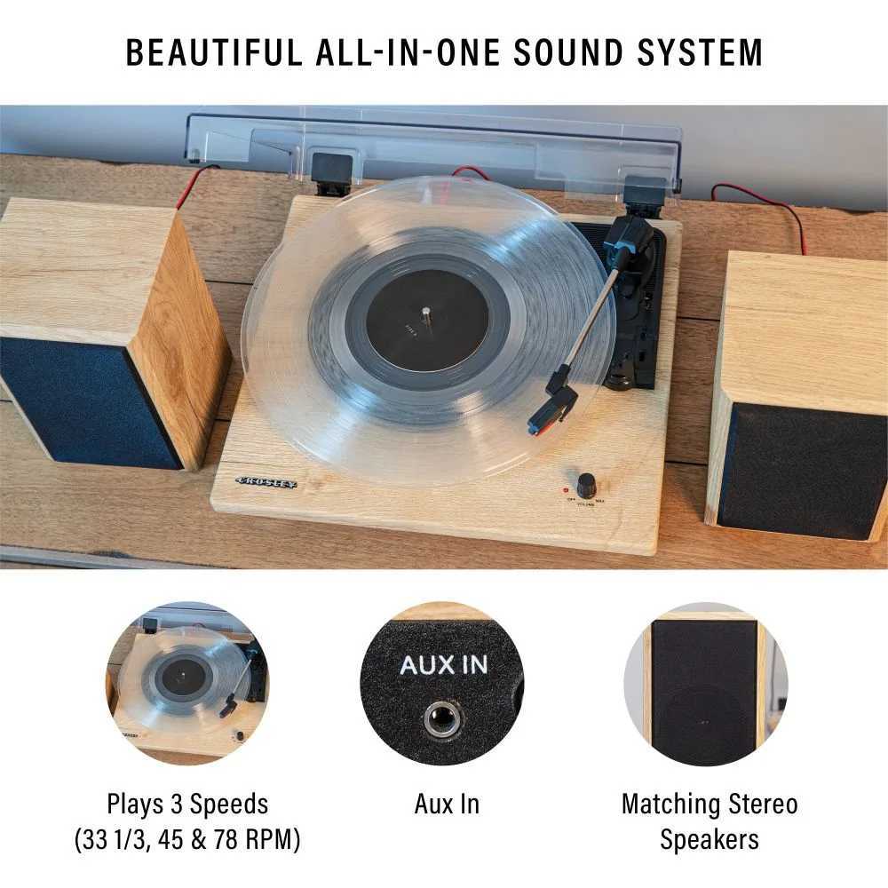 A complete sound system, the Crosley Brio Turntable System - Natural features a wooden turntable, clear acrylic vinyl, and matching stereo speakers