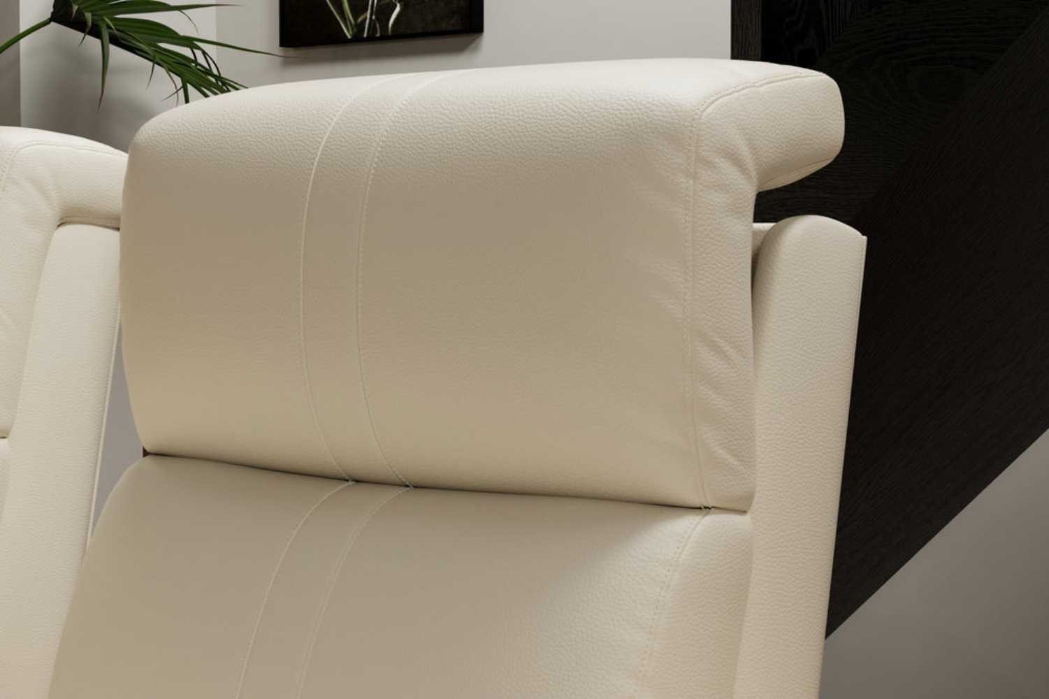 A detailed shot of the headrest from the Valencia Natalie Home Theater Seating emphasizes ergonomic design and premium leather material