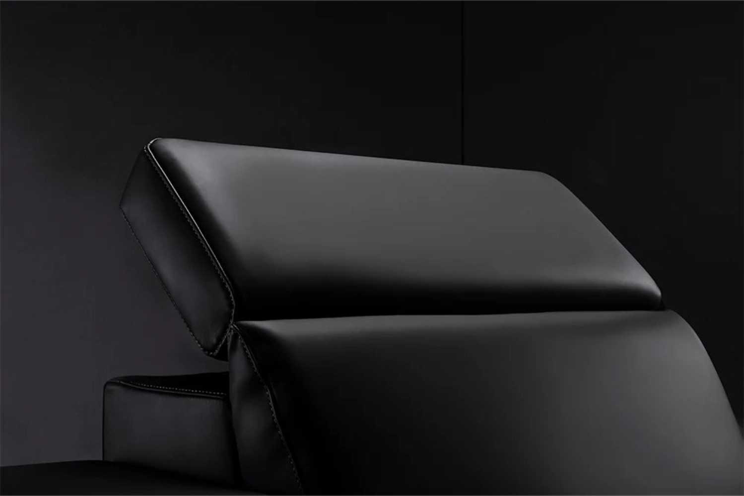 A detailed view of the motorized headrest on Valencia Barcelona Home Theater Seating