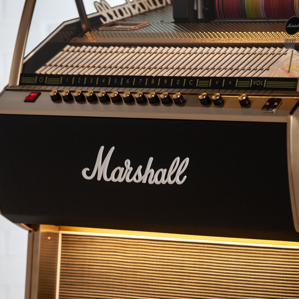 A detail shot of the Marshall Rocket CD Jukebox - Black shows its control panel with labeled buttons and volume dials