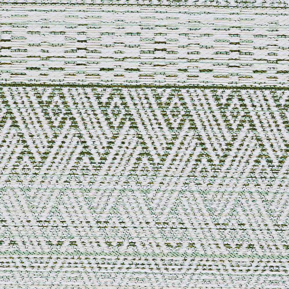 A flat section of the Couristan Cape Indoor/Outdoor Rug - Gables/Palm reveals repeating chevron and diamond motifs in green and ivory
