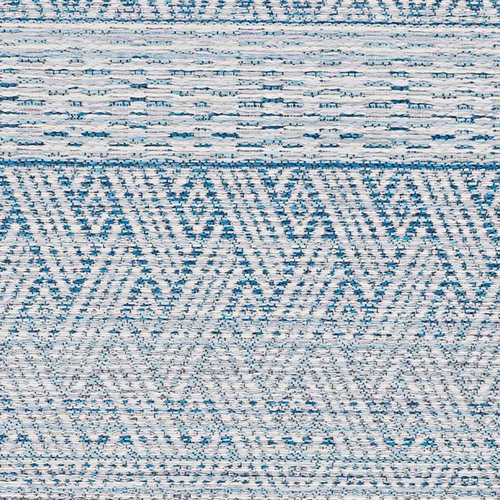 A flat view of the Couristan Cape Indoor/Outdoor Rug - Gables/Surf presents its repeating geometric motifs in calming surf blue tones with ivory highlights