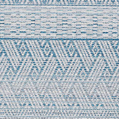 A flat view of the Couristan Cape Indoor/Outdoor Rug - Gables/Surf presents its repeating geometric motifs in calming surf blue tones with ivory highlights