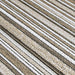 A folded section of the Couristan Cape Indoor/Outdoor Rug - Brockton/Light Brown-Ivory