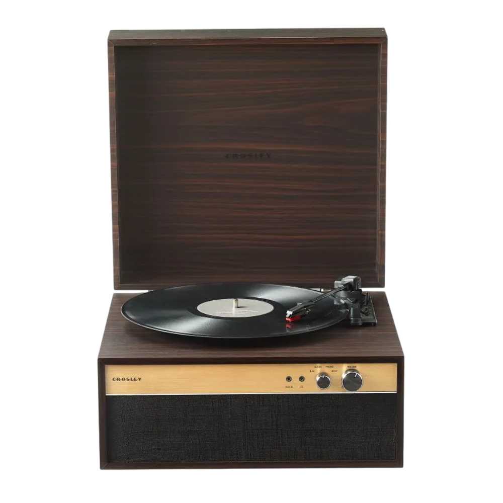 A front-facing tabletop view of the Crosley Jasper Turntable - Walnut displays its speaker grille, control panel, and playing vinyl record