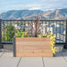 A front-facing view shows the Outdoor Living Today 4×1.5 Urban Raised Garden Bed on a rooftop with a scenic mountain backdrop