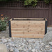 A front view shows the Outdoor Living Today 4×1.5 Urban Raised Garden Bed filled with fresh soil in a stone garden