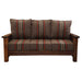 A fully assembled Fireside Lodge Barnwood Sofa with brown cushions accented by colorful vertical stripes in red, green, and beige