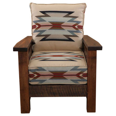 A head-on view of the Fireside Lodge Barnwood Lounge Chair displays its colorful Native-inspired cushion design framed by thick wood arms