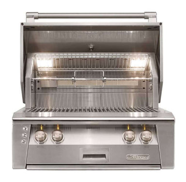 Alfresco Grills 30″ Luxury Grill Built-In with its hood open, revealing internal lights, stainless steel grates, and a rotisserie system