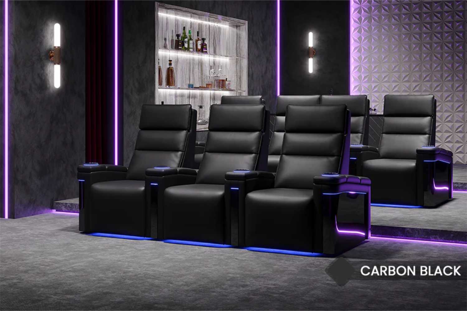 A modern home theater setup features multiple recliners with vibrant RGB lighting of the Valencia Monza Pillow Top Carbon Fiber Home Theater Seating