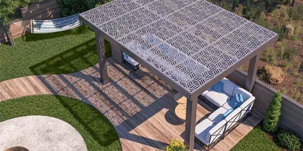 An aerial perspective displays the full layout of the Structureworks Solare Fiberglass Pergola over a wooden deck