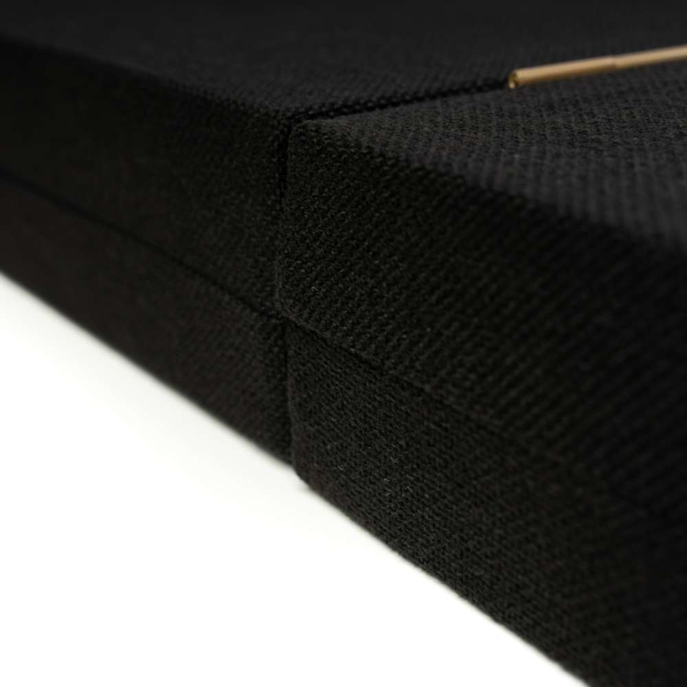 Angled close-up of the fabric-wrapped edge and panel thickness of GIK Acoustics ScreenPanel Vocal Screen