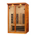 Angled from the left, Golden Designs Dynamic Llumeneres 2 Person Full Spectrum Near Zero EMF Far Infrared Sauna shows its cedar side wall, glass doors and carbon panels inside
