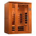 Angled from the left, Golden Designs Dynamic Lugano 3 Person Full Spectrum Infrared Sauna shows its cedar side wall, bronze glass door and carbon panels