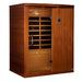 Angled from the left, Golden Designs Dynamic Madrid Limited Elite 3 Person Ultra Low EMF Far Infrared Sauna shows its side wall, bronze glass door and solid wood front panel
