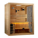 Angled from the left, Golden Designs Hanko 2-3 Person Traditional Sauna shows its cedar side wall, glass door with a tall black handle and lit bench inside