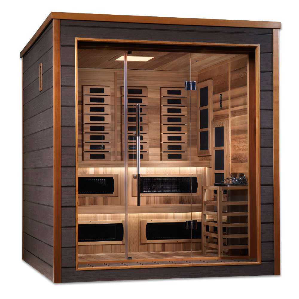 Angled from the left, Golden Designs Karlstad 6 Person Outdoor-Indoor PureTech Hybrid Full Spectrum Sauna shows its dark side wall, glass front and two-level cedar benches with a guarded stove