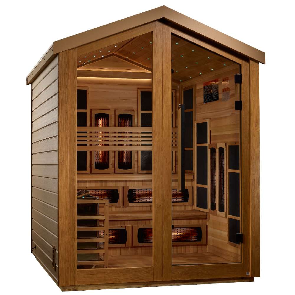 Angled from the left, Golden Designs Kaskinen 6 Person Barn Hybrid Outdoor Sauna shows its cedar side wall, peaked roof and red-glowing infrared panels inside