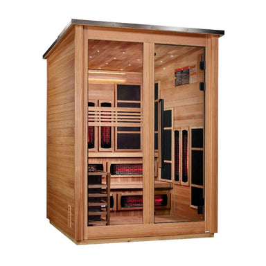 Angled from the left, Golden Designs Kaskinen 6 Person Pacific Cedar Barn Hybrid Outdoor Sauna shows its cedar side wall, dark roof edge and glass doors