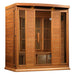 Angled from the left, Golden Designs Maxxus Chaumont 4 Person Near Zero EMF Far Infrared Sauna in Red Cedar shows its red cedar side wall, glass door and lower heaters