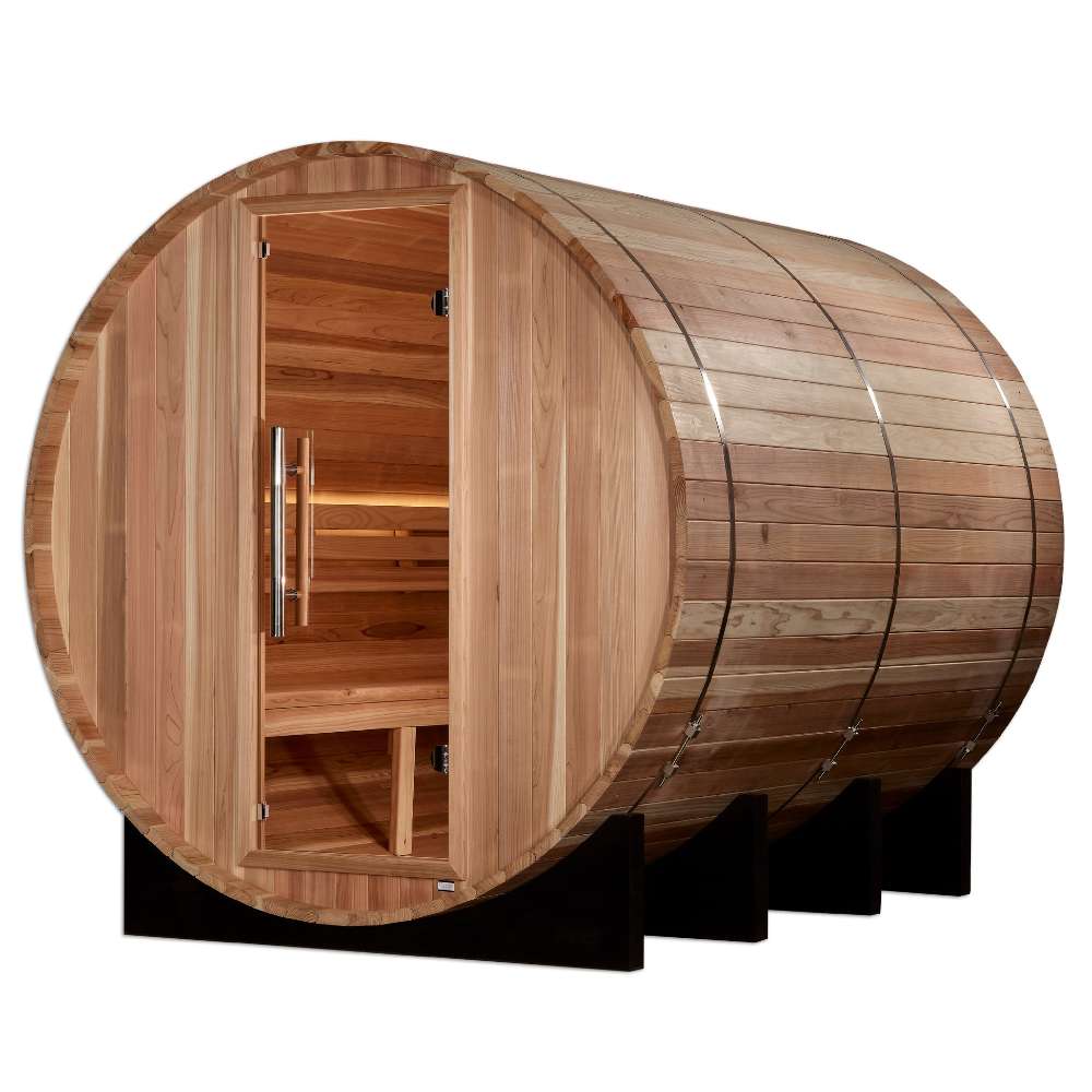 Angled from the side, Golden Designs Klosters 6 Person Barrel Traditional Sauna shows its curved cedar staves, glass door and benches inside