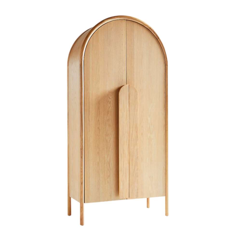Angled front view of Crate & Barrel Annie 38" Natural Storage Cabinet with double doors and sculpted wood handle