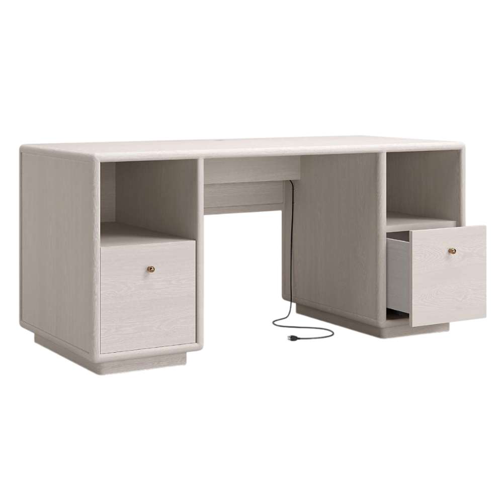 Angled front view of Crate & Barrel Lafayette 64" Whitewashed Desk with Outlets with one drawer pulled open