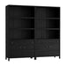 Angled view of Crate & Barrel Keane 40" Black Wood Storage Bookcase, Set of 2 highlighting its black wood finish and spacious storage design