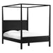 Angled view of Crate & Barrel Keane Black Solid Wood Queen Canopy Bed showcasing its minimalist black canopy frame and solid wood construction
