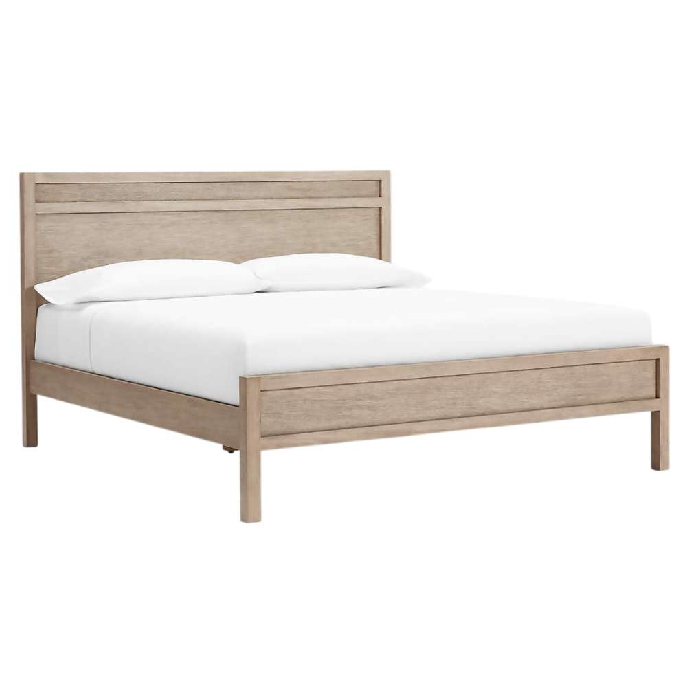 Angled view of Crate & Barrel Keane Weathered Natural Solid Wood King Bed displaying its minimalist solid wood frame with a weathered natural finish