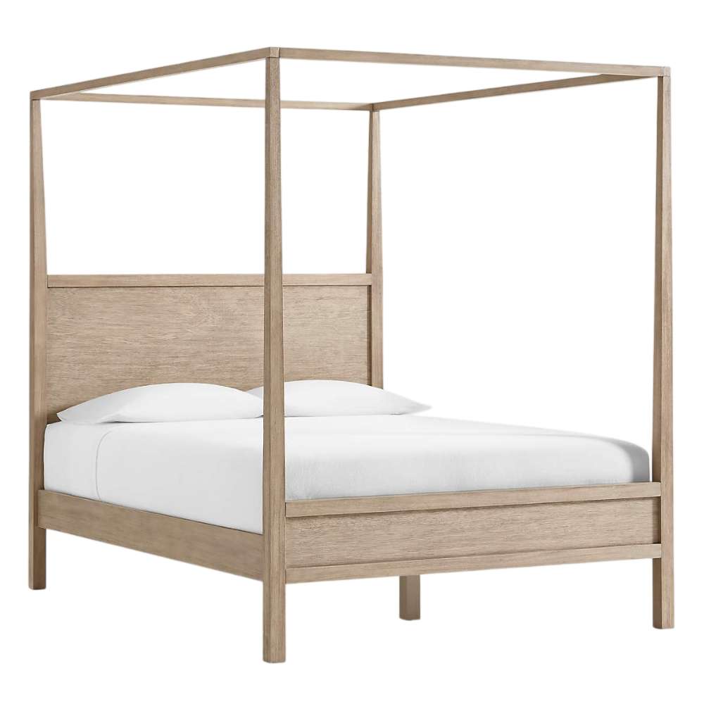 Angled view of Crate & Barrel Keane Weathered Natural Solid Wood Queen Canopy Bed showcasing its open canopy frame and solid wood construction