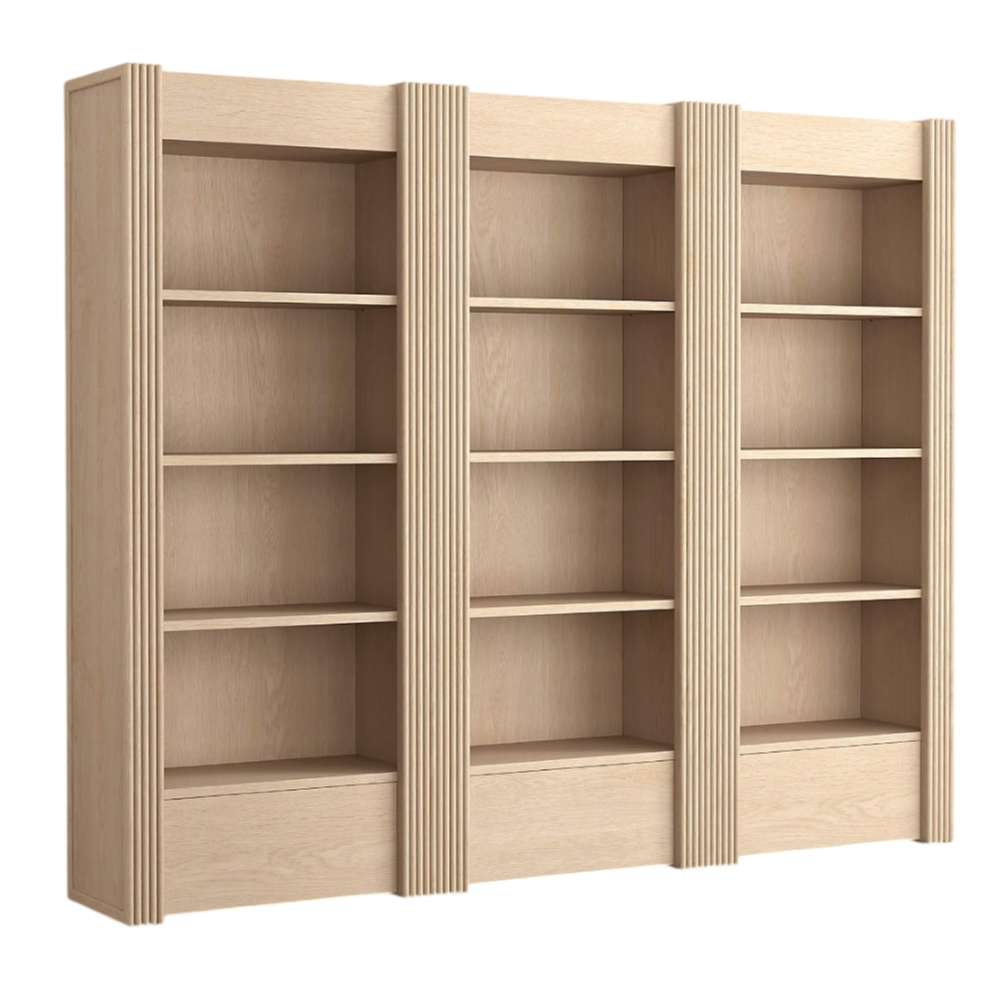 Angled view of Crate & Barrel Siena 102" Whitewash Wood 4-Shelf Storage Bookcase with Drawer, Set of 3 with fluted details, four open shelves each, and lower storage drawers