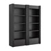 Angled view of Crate & Barrel Siena 68" Black Wood 4-Shelf Storage Bookcase with Drawer, Set of 2 featuring eight open shelves and dual storage drawers