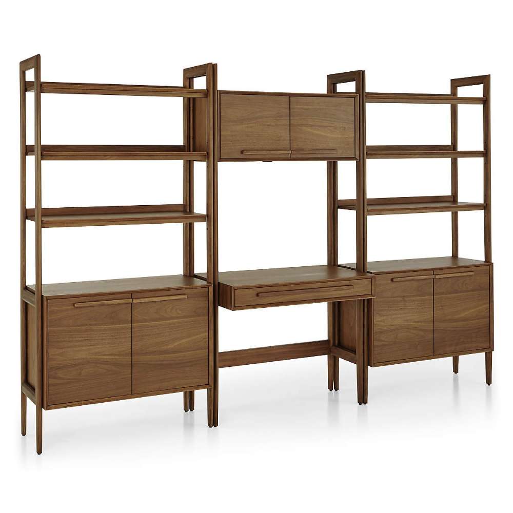 Angled view of Crate & Barrel Tate 108" Walnut Bookcase Desk with Outlet Set, highlighting spacious shelving, cabinet storage, and a built-in workspace