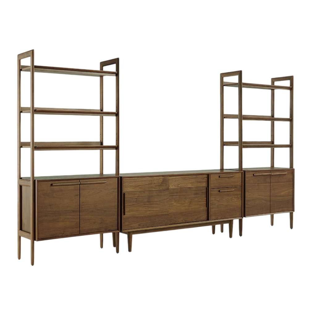 Angled view of Crate & Barrel Tate 136.5" Walnut Storage Media Console and Bookcase Set highlighting its walnut finish and built-in storage