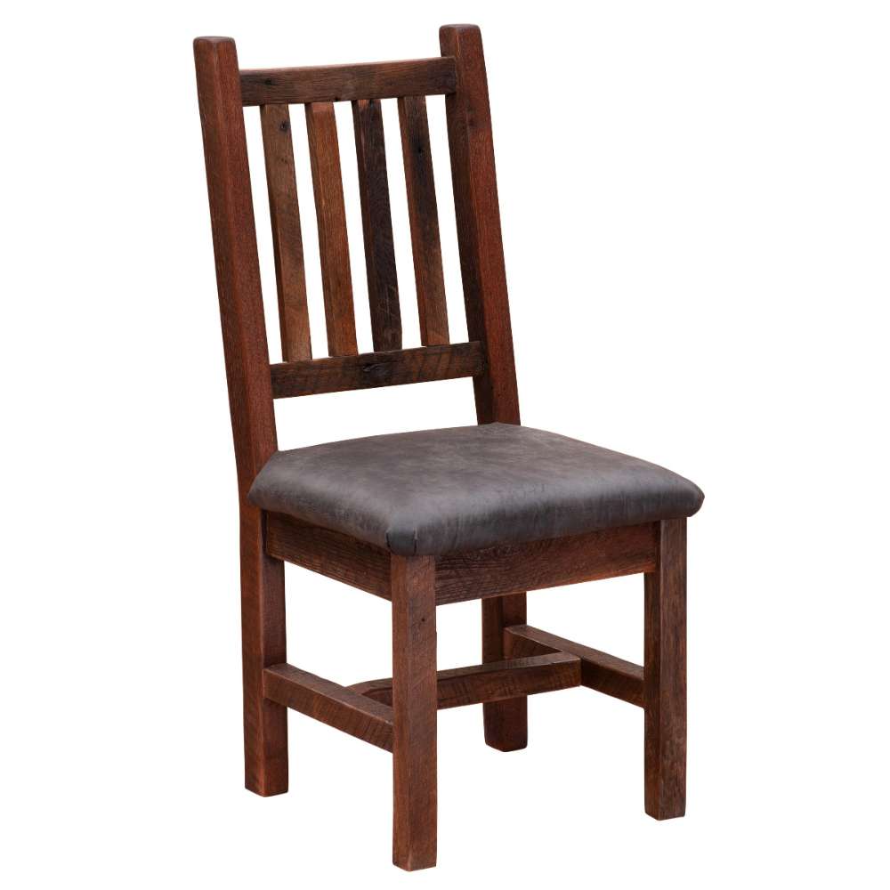 Angled view of Fireside Lodge Barnwood Prairie Dining Side Chair highlighting the solid wood legs, slatted backrest, and dark upholstered cushion
