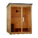 Angled view of Golden Designs Arlberg 3 Person Flat Roof Traditional Outdoor Sauna showing its hemlock side wall, dark flat roof and the guarded stove through the glass