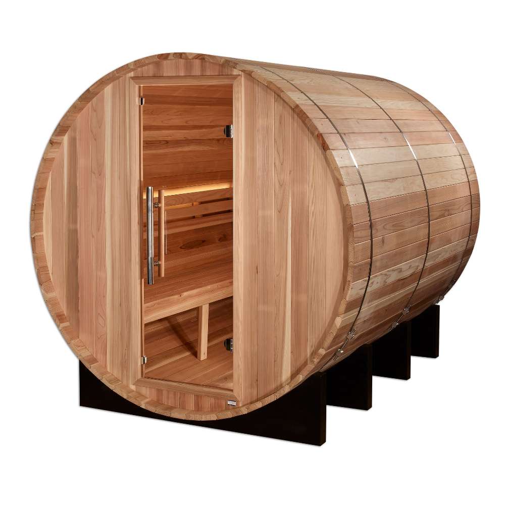 Angled view of Golden Designs Klosters 6 Person Barrel Traditional Sauna showing its round cedar barrel body, glass front door with a long handle and black cradle base