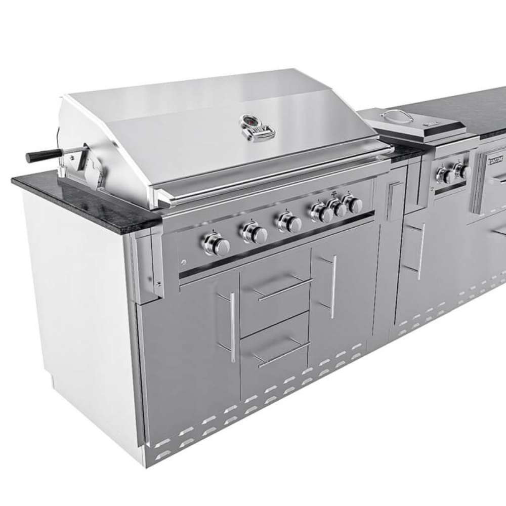 Angled view of Sunstone French Quarter 13ft 7in Outdoor Kitchen Island Package highlighting the closed grill, side burner, and stainless steel cabinets