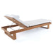 Angled view of Westminster Teak Horizon Chaise Lounger with a cushion and neck roll
